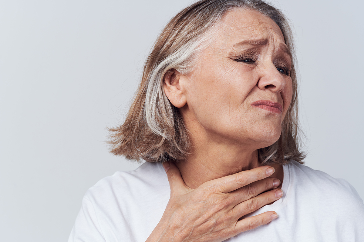elderly woman in white t-shirt health problems treatment dissatisfaction elderly woman in white t-shirt health problems treatment dissatisfaction. High quality photo