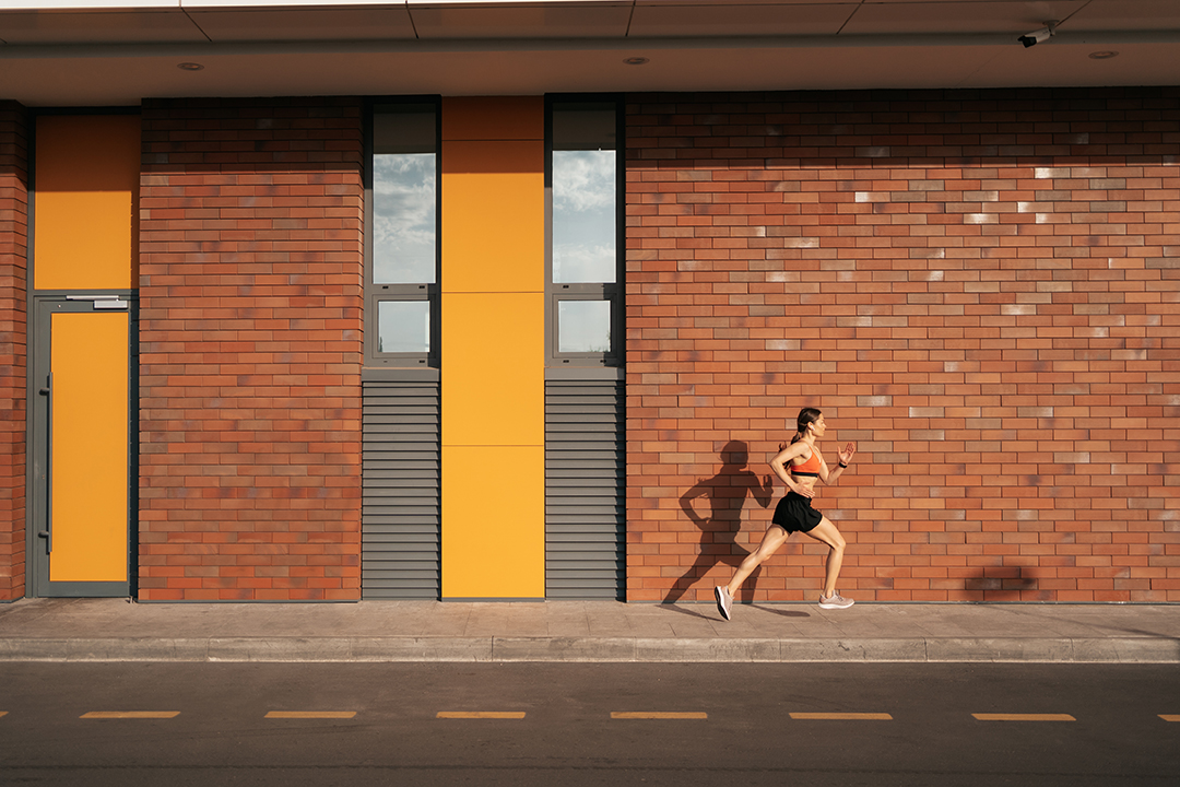 Female fitness model training outside in the city Fitness fitness services Working out physical physical well being physical strength strength training weight loss weight management muscle personal training strength training weight