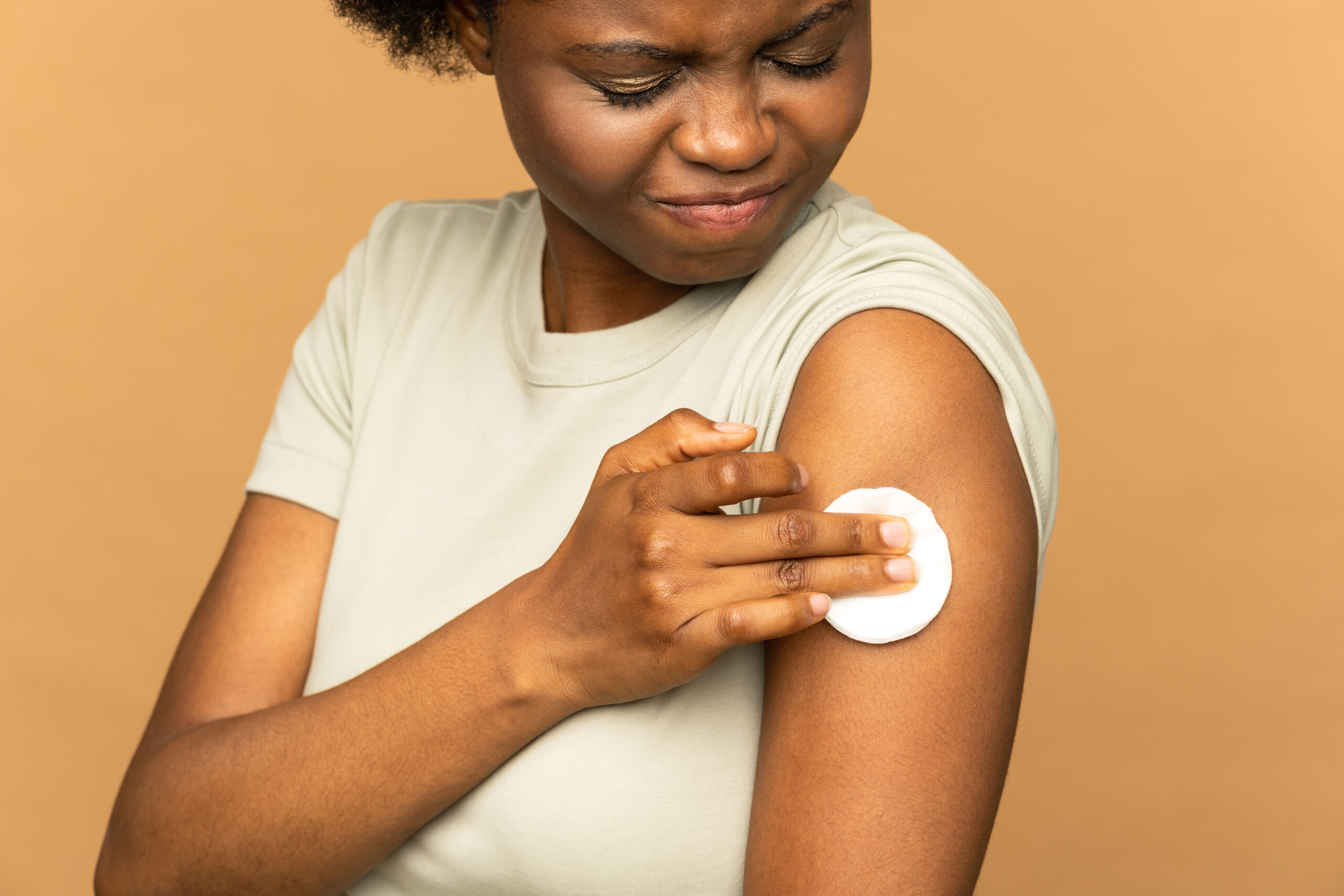 vaccinated-african-woman-showing-arm-with-cotton-p-2023-11-27-05-17-17-utc vaccinated-african-woman-showing-arm-with-cotton-p-2023-11-27-05-17-17-utc
