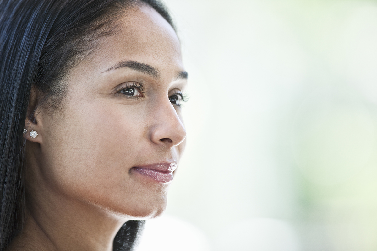 Mixed race caucasian woman in a business center lobby. Mixed race caucasian woman in a business center lobby.