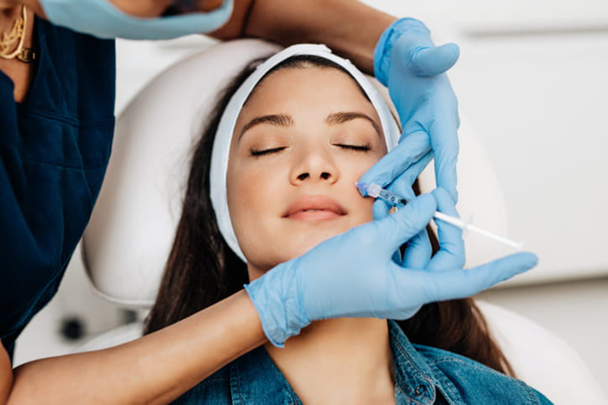 woman getting botox injection woman getting botox injection
